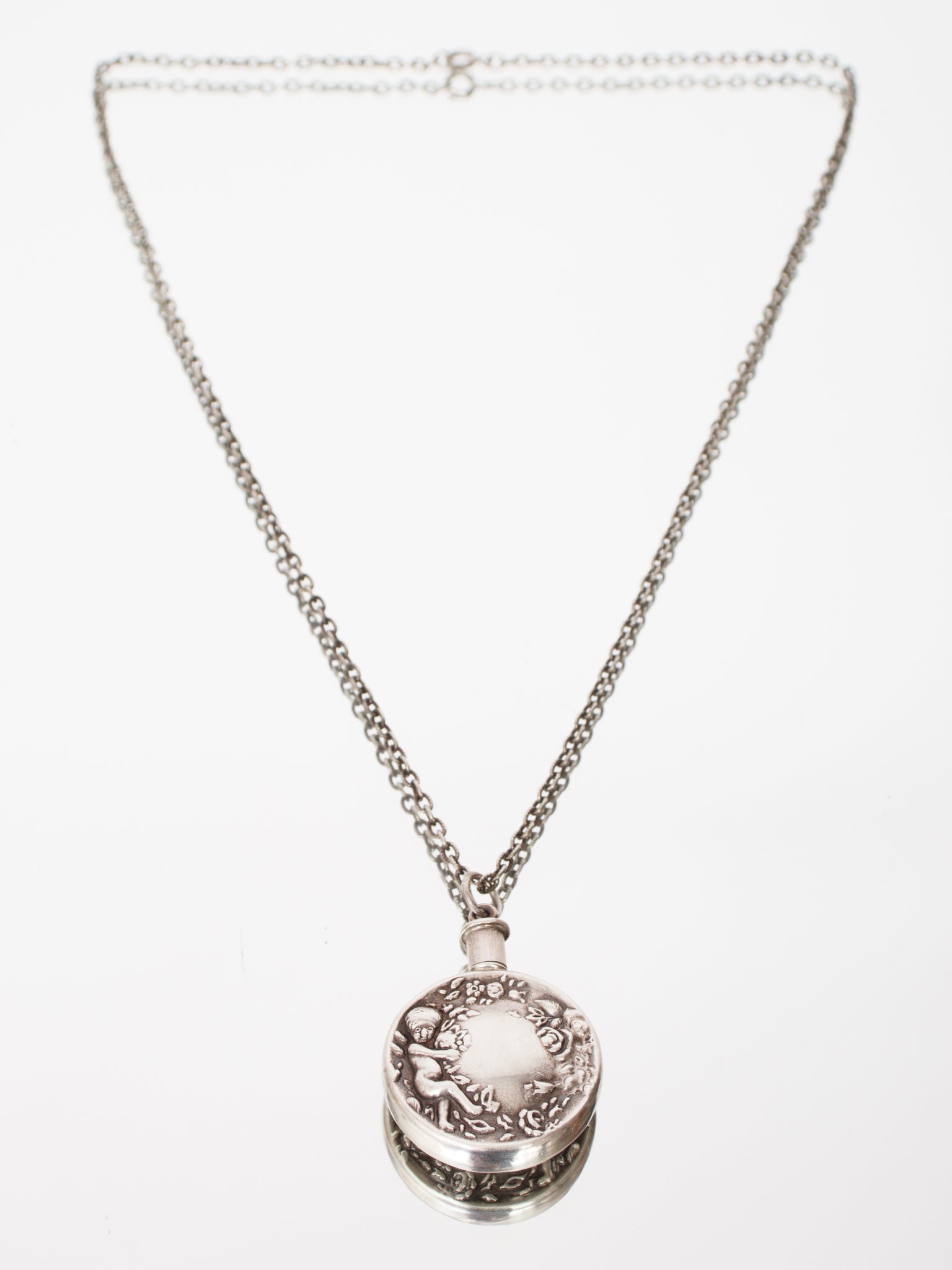 1970s Silver Cherub Perfume Bottle Pendant Necklace
