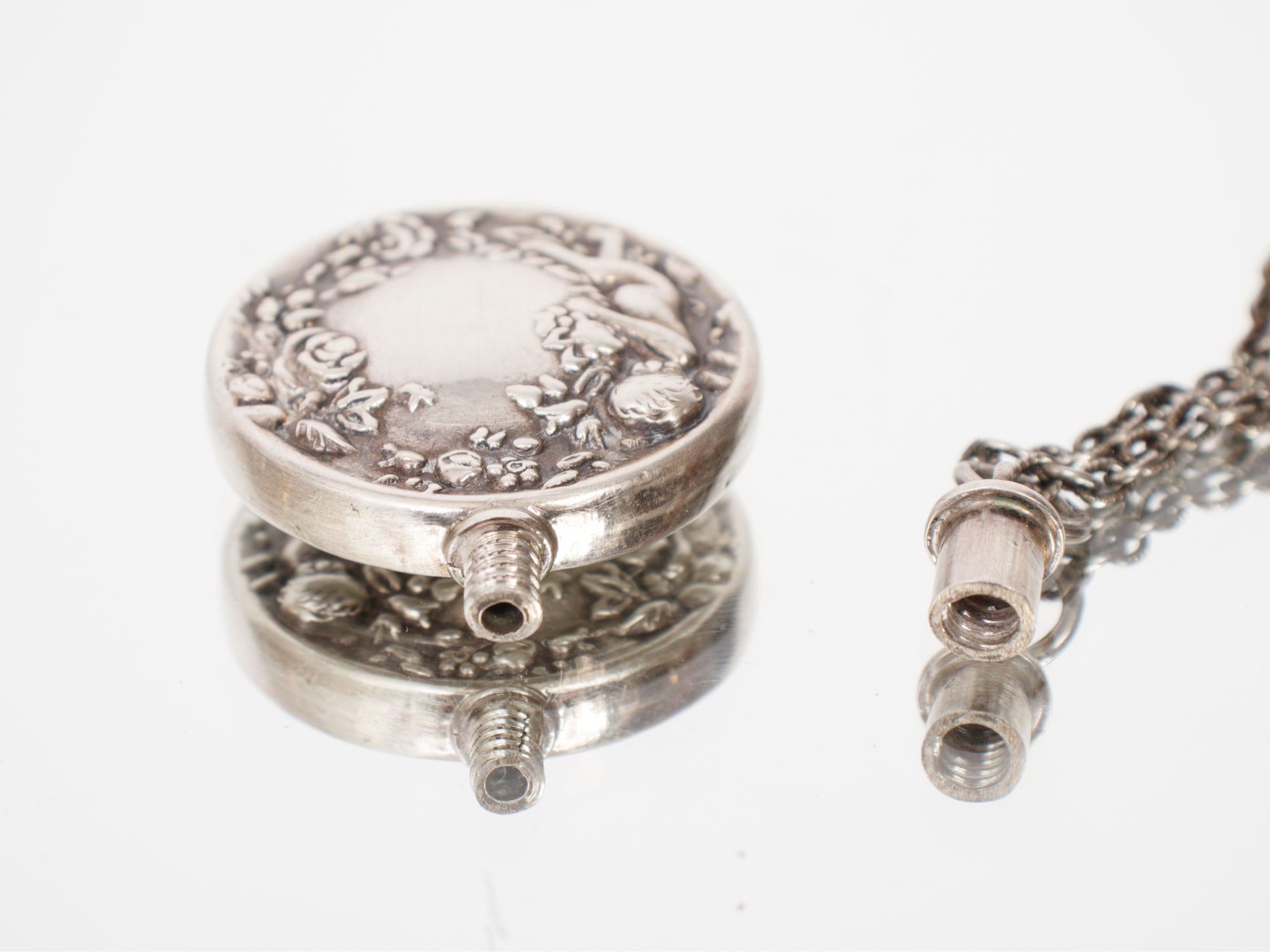 1970s Silver Cherub Perfume Bottle Pendant Necklace