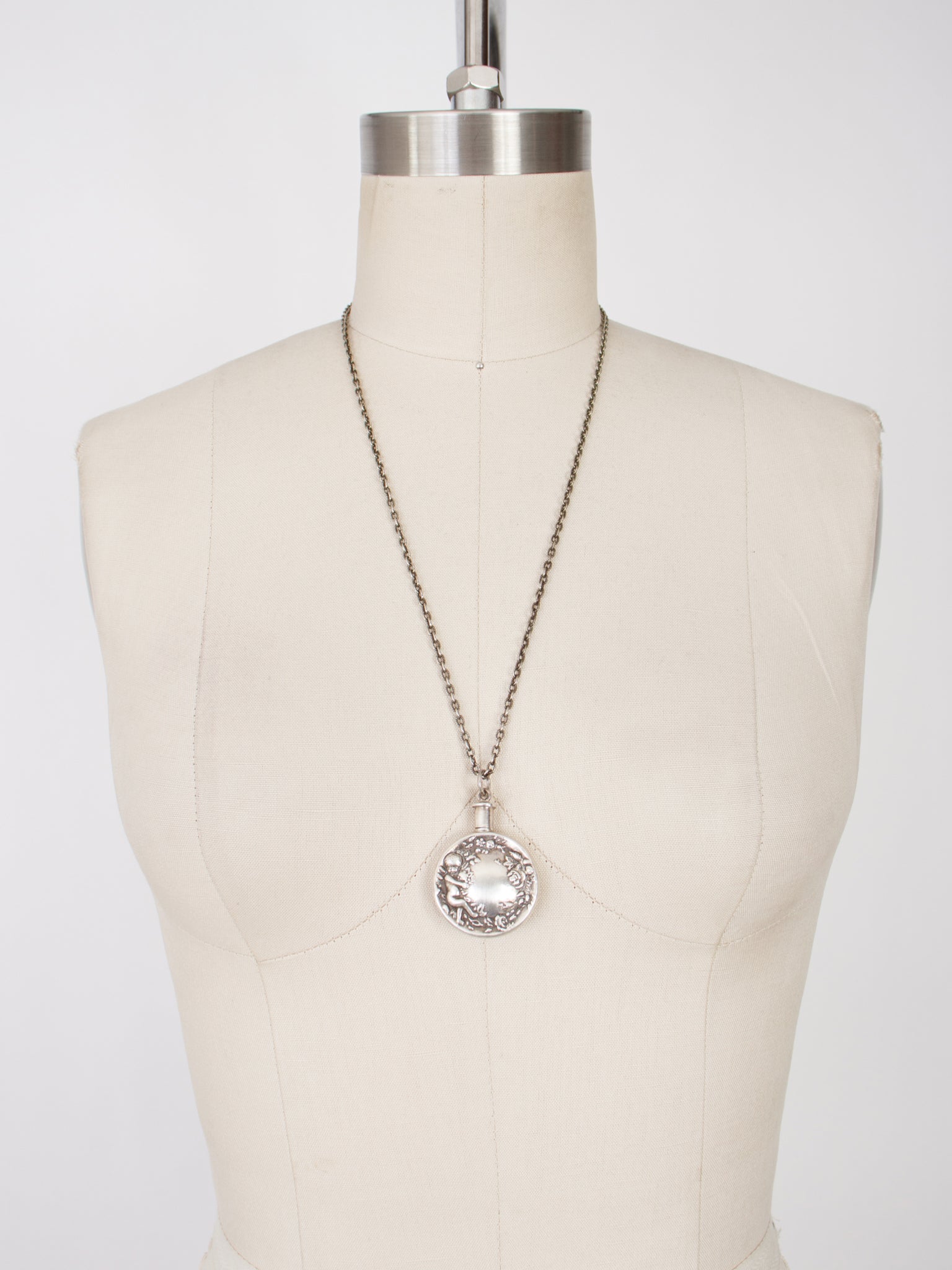 1970s Silver Cherub Perfume Bottle Pendant Necklace